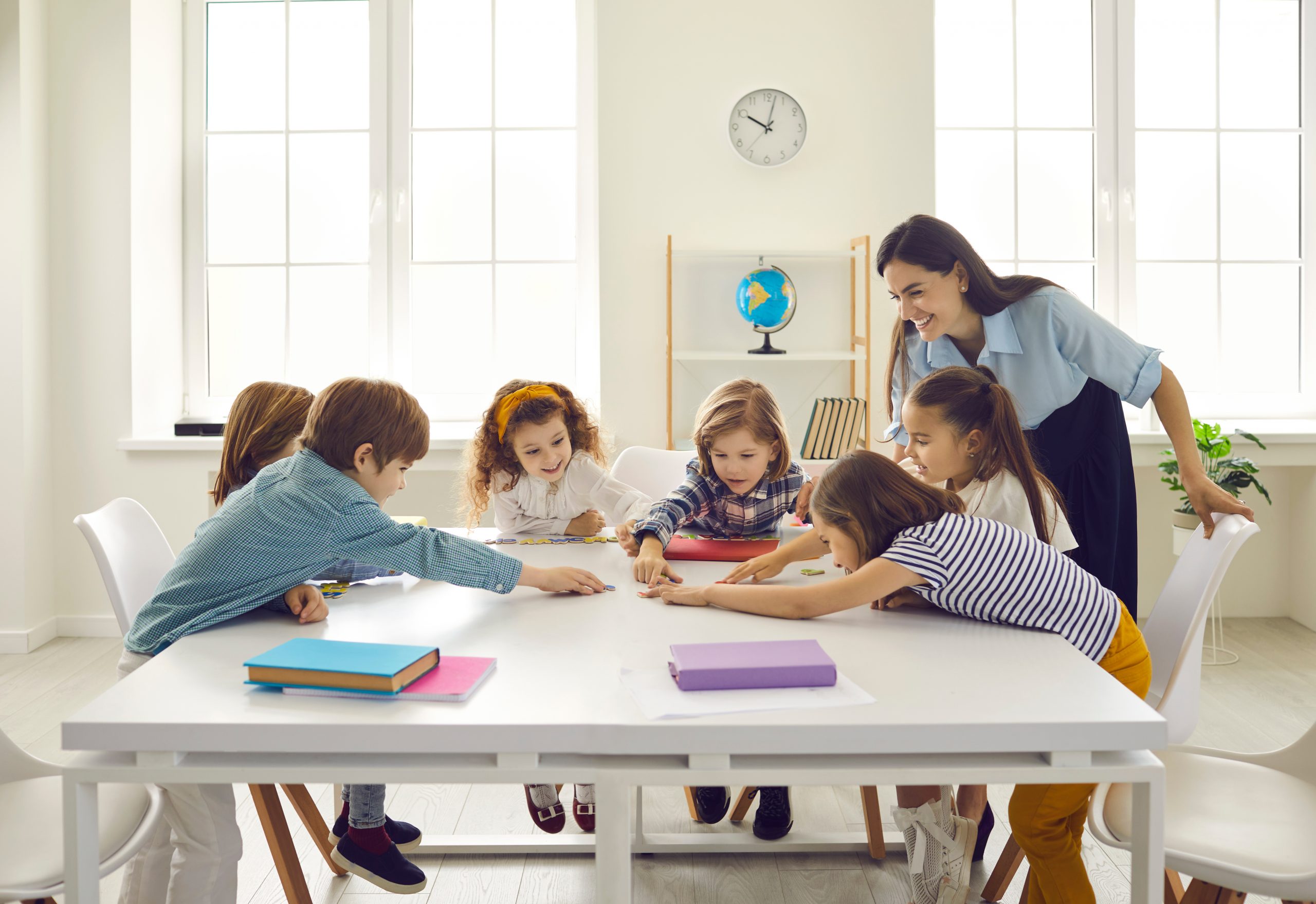 language classes, language school, group lessons, private tutoring, multilingual, language learning Language learning center with students in group and private lessons.